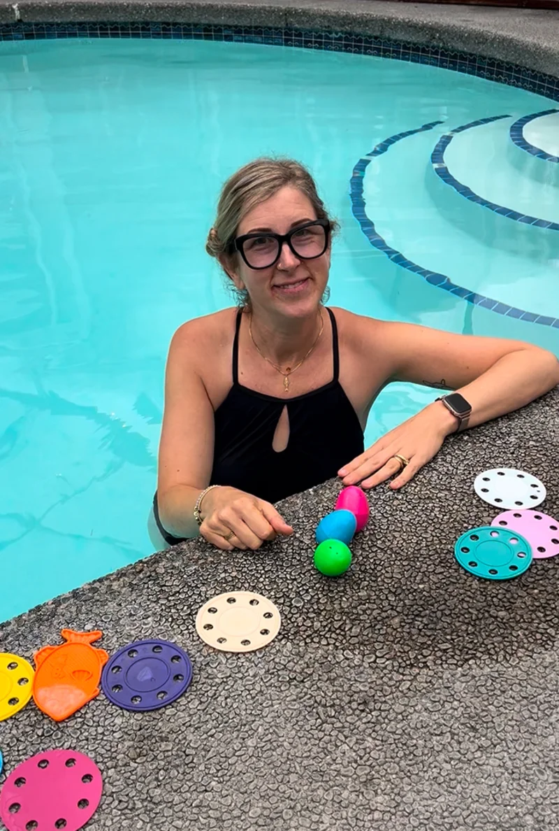 Emily Bradley, Founder of Little Fish Swim School, by the pool
